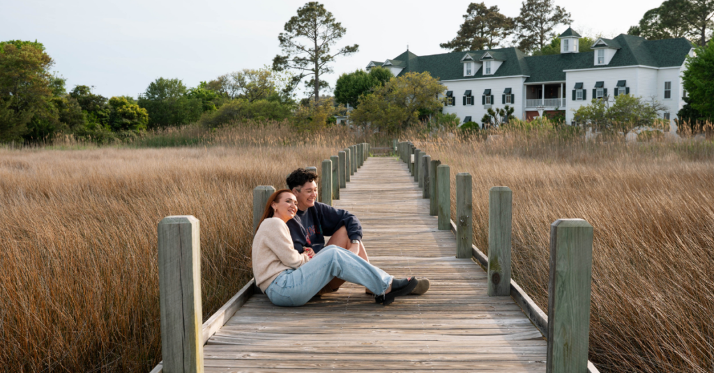 queer people laughing together in OBX