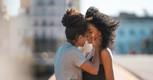 BLACK LESBIAN COUPLE KISSING