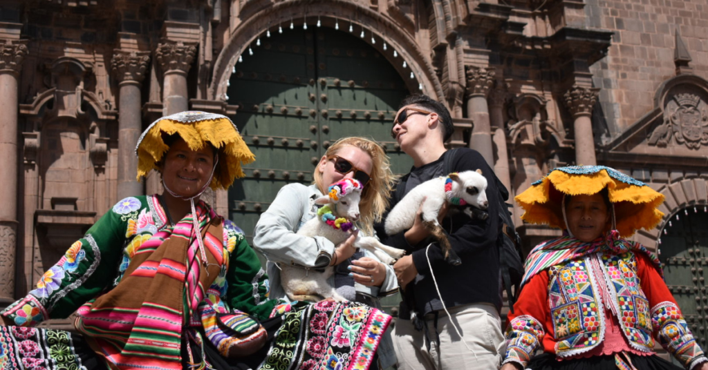 queer people holding lambs in Cusco Peru